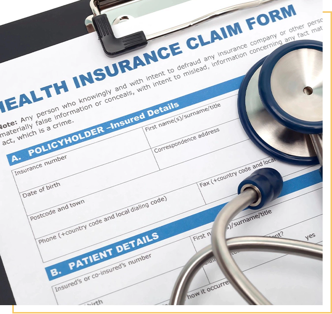 A health insurance claim form with stethoscope on top.